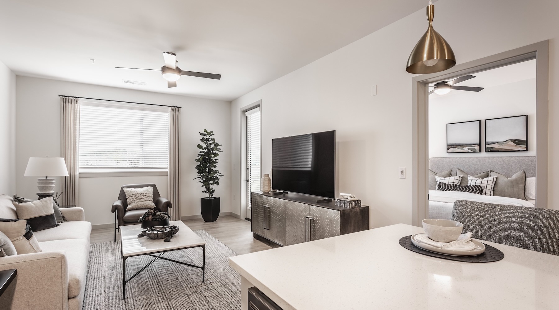 a living room with a couch and a table