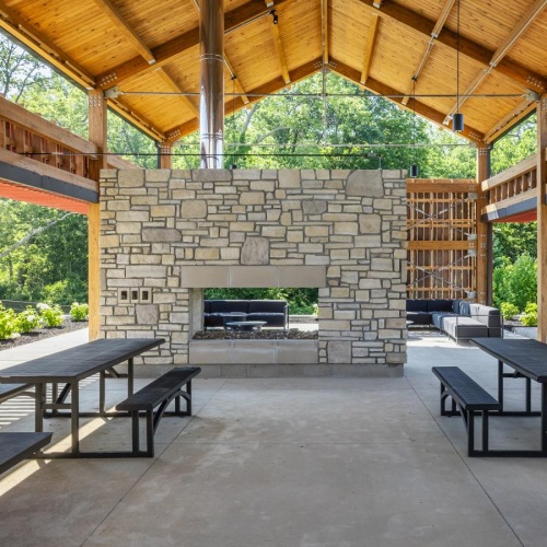 a group of tables and chairs outside