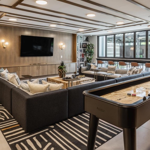 a room with a table and chairs