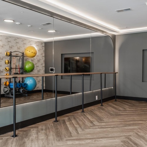 a room with balloons and a tv